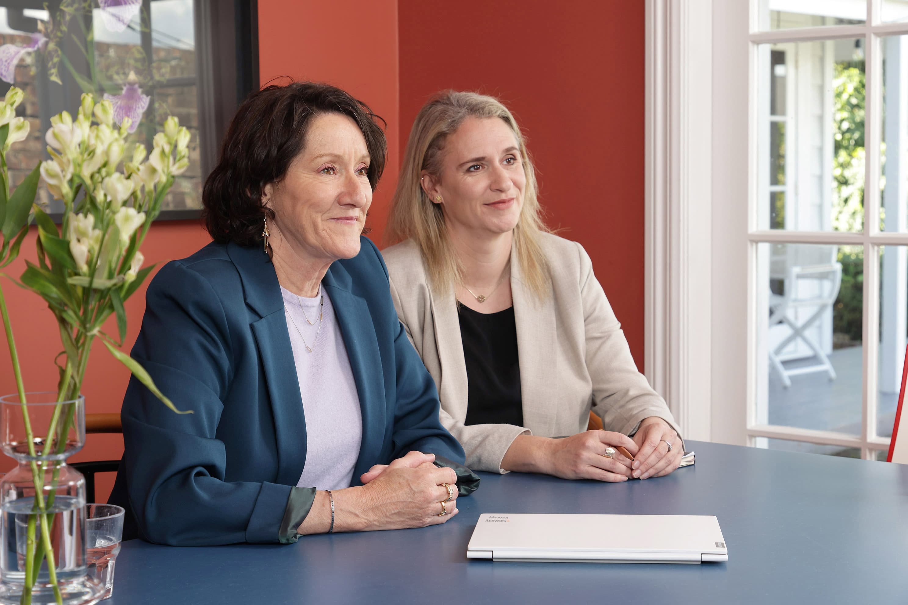 Pru Etcheverry (left) and Georgie Hackett at a meeting table